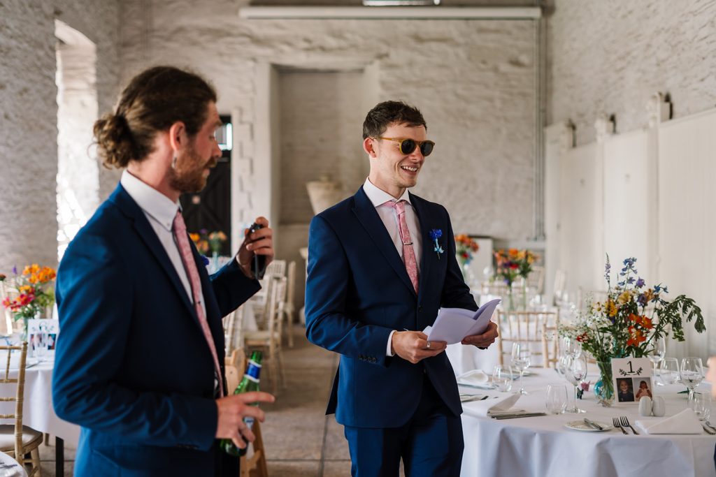 Candid photo of groomsmen at Hestercombe
