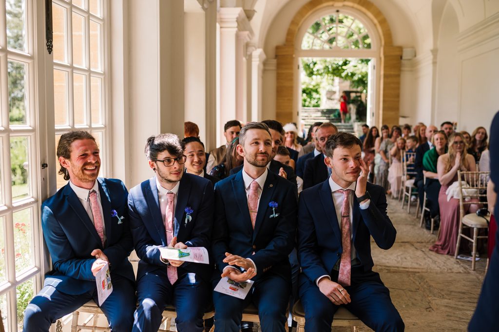 Photo of groomsmen reactions