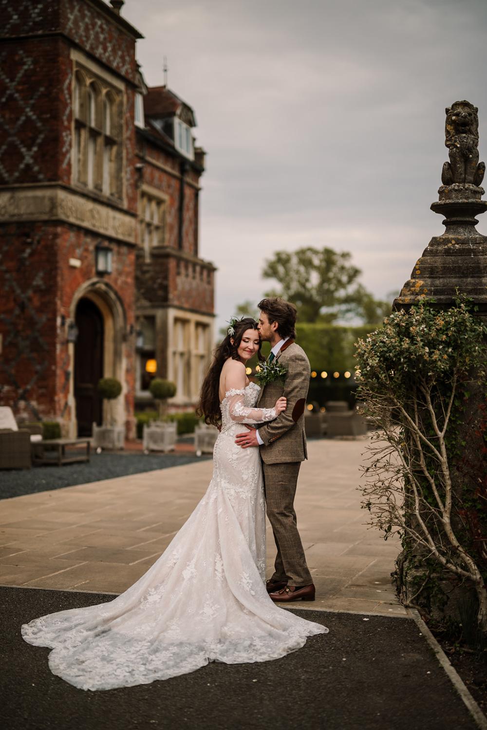 Photography of Bride & Groom outside Burley Manor Wedding